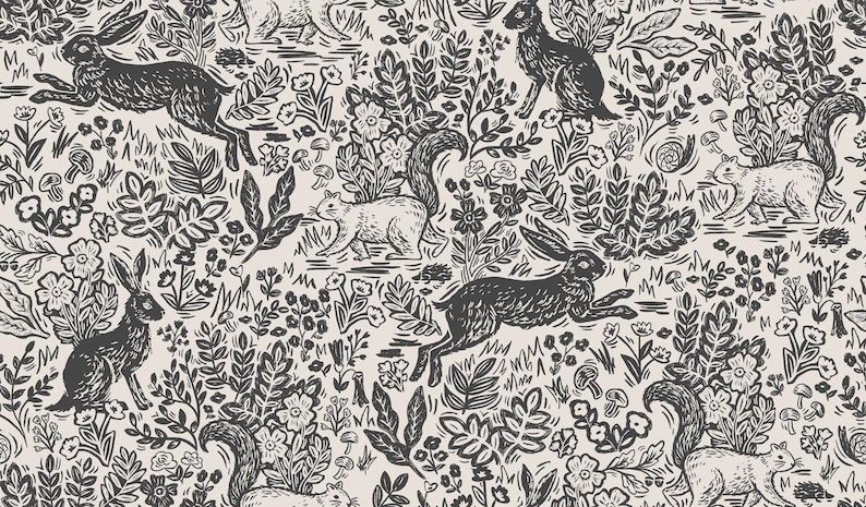 May include: A black and white repeating pattern featuring stylized illustrations of rabbits, squirrels, and flowers. The background is a light cream color.