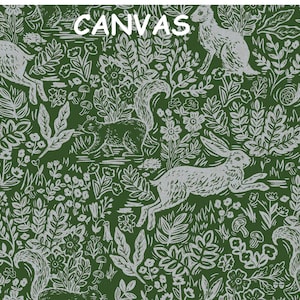 May include: Green canvas fabric with a repeating pattern of white rabbits, squirrels, and foliage. The word "CANVAS" is printed in white at the top. The design features a woodland theme.