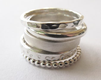 Sterling silver stacking ring set, five stacking rings with various textured finishes