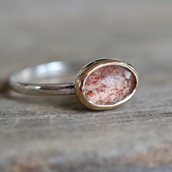 Gold and silver strawberry quartz ring. Solid gold bezel, sterling silver band, rose-cut strawberry quartz.