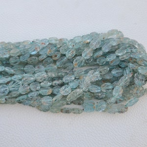 Moss Aquamarine carved beads oval shape 8mm to 15mm size. Natural aquamarine carved beads. 13&#39;inches strand.