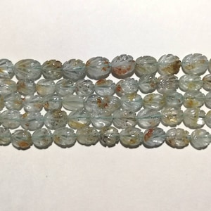 Moss Aquamarine carved beads oval shape 8mm to 15mm size. 13inches strand. Natural aquamarine.