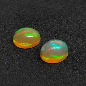 Opal Cabochons pair 9×7 MM. Oval Shape. Excellent fire. Ethiopian opal Loose Cabochons