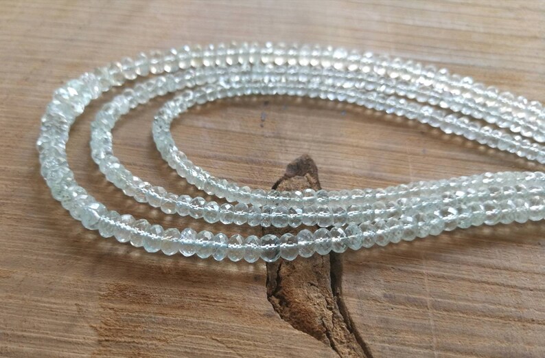 Long strand. 17Natural Aquamarine faceted rondelle beads lot1 Clean and luster based natural aquamarine Size 09mm-04mm No heat