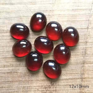 Garnet oval shape cabochons 12x10MM, 14x10MM, 16x12MM, 18x13MM. Handpolished Hessonite Garnet calibrated gemstones. Price per stone.