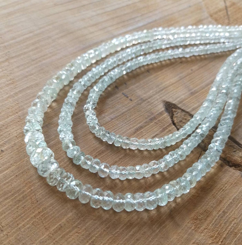 Long strand. 17Natural Aquamarine faceted rondelle beads lot1 Clean and luster based natural aquamarine Size 09mm-04mm No heat
