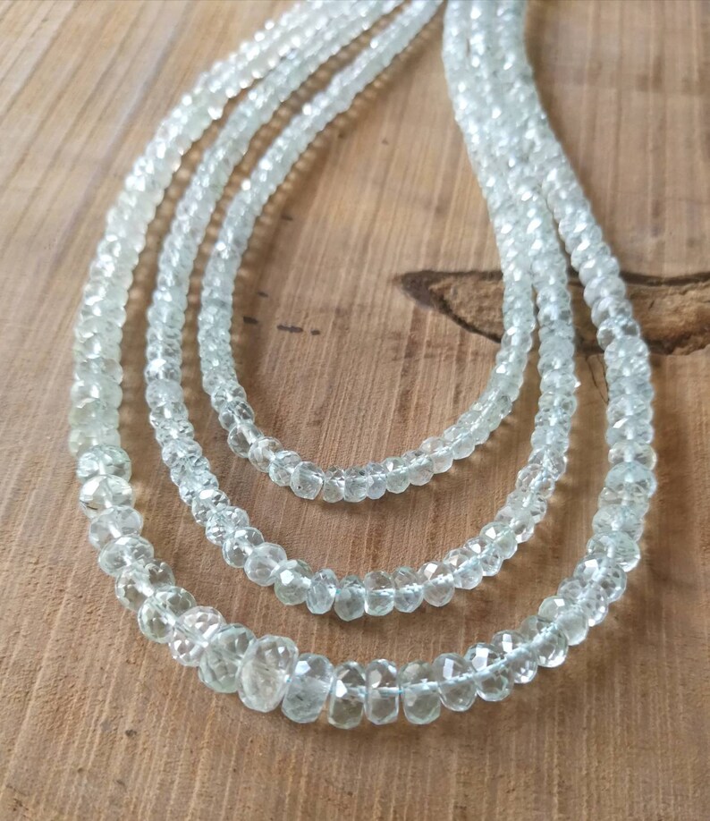 Long strand. 17Natural Aquamarine faceted rondelle beads lot1 Clean and luster based natural aquamarine Size 09mm-04mm No heat