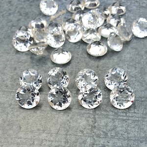 AAA Clear Quartz 8MM faceted round gemstone. Crystal Quartz gemstone.