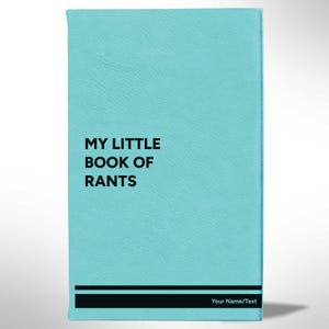 May include: A turquoise book with the title "MY LITTLE BOOK OF RANTS" in black text. A black horizontal stripe is at the bottom with space for personalization. The book has a textured cover.