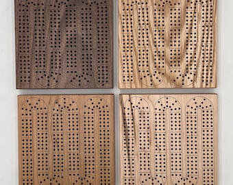 Tablero de cribbage de viaje con almacenamiento de clavijas