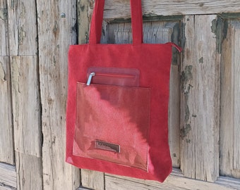 Red corduroy shopper bag with pockets. Corduroy shopper bag with leather pockets. Red corduroy tote bag with leather pockets.