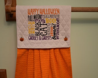 Halloween words embroidered kitchen towel in orange