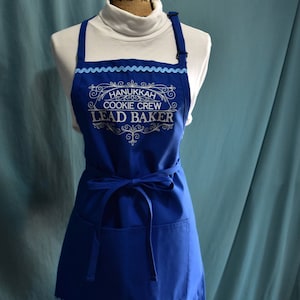 Hanukkah Cookie Crew aprons in royal blue