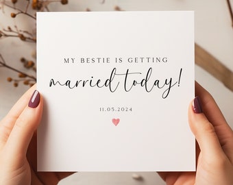 May include: White card with black text that reads "My bestie is getting married today!" with the date "11.05.2024" and a small pink heart below.