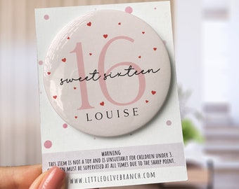 May include: Pink and white round button with the number 16 and the text "sweet sixteen" in pink. The button also has the name "LOUISE" in black text and red hearts scattered around the button.