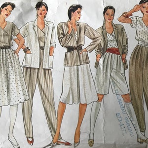 May include: A sewing pattern featuring five different outfits for women. The outfits include a white blouse with a polka dot skirt, a white jacket with striped trousers, a striped jacket with a white skirt, a polka dot blouse with white shorts, and a white blouse with brown trousers. The pattern is from the designer Butterick, and the pattern number is 6724-437.