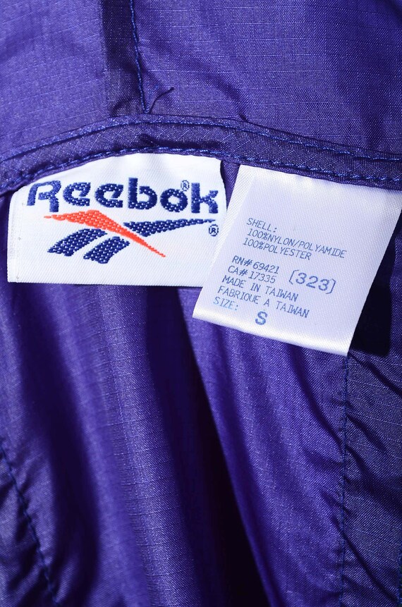 Veste d chauffement coupe vent Reebok pour homme violet vert