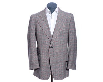 Chaqueta tipo blazer deportiva vintage de los años 70, talla 45R, con solapas anchas y dos botones, a cuadros grises y rojos.