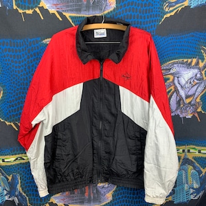 May include: A black, red, and white windbreaker jacket with a zipper closure. The jacket has a logo on the left chest that says "Pro Player".