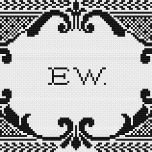 May include: A black and white cross stitch pattern featuring a central oval frame with ornate scrollwork borders. The letters E and W are centered within the frame, followed by a period. The design is set against a grid background.
