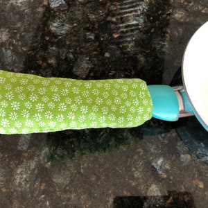 Handtagsskydd för gjutjärnspannor - Stekpanna