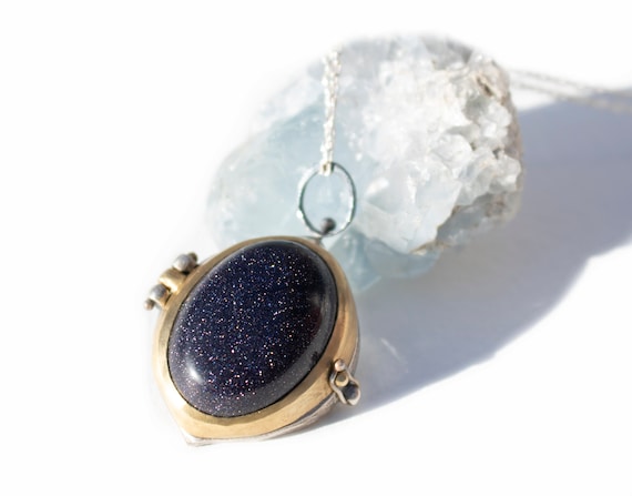 Handmade Athena Locket in Sterling Silver, Brass, and Blue Goldstone | Owl Necklace