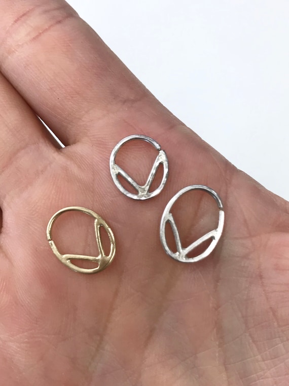 Handmade geometric wire septum ring in sterling silver and 14k yellow gold