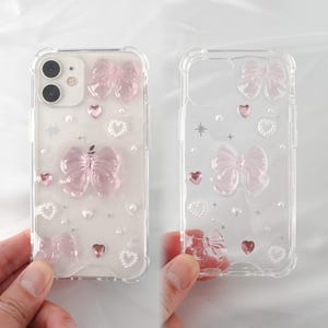 Funda para teléfono de resina hecha a mano con diseño de corazón de cinta