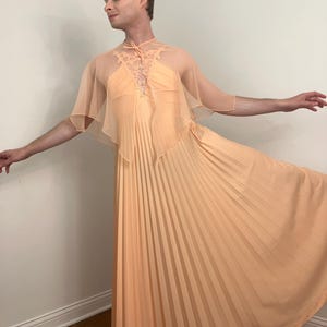 70s Peach accordion pleat maxi dress with matching sheer capelet