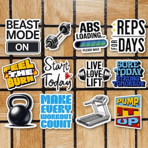 May include: A collection of eleven fitness-themed vinyl stickers featuring various motivational phrases and gym equipment illustrations, including a dumbbell, a kettlebell, and a treadmill, with bold typography in black, blue, yellow, and red.