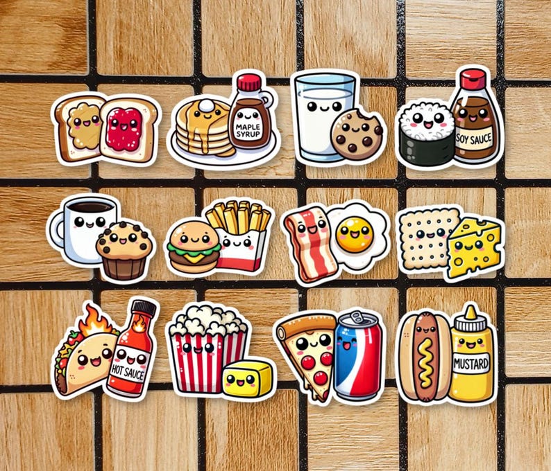 May include: A set of 12 colorful cartoon food stickers featuring various breakfast, lunch, and dinner items. The stickers include a pancake stack with maple syrup, a glass of milk with a cookie, a hot dog with mustard, a taco with hot sauce, a pizza with a soda, a cheeseburger with fries, bacon and eggs, a cup of coffee with a muffin, a peanut butter and jelly sandwich, a sushi roll with soy sauce, popcorn with butter, and a cracker with cheese.