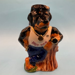 Rottweiler dog figurine.Original ceramic cartoon figure.
