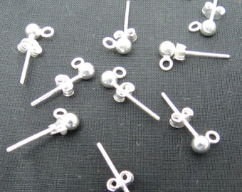 May include: Ten silver earring posts with a small ball at the end of each post. The posts have a loop on the back for attaching to an earring.