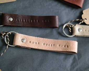 Personalized key rings made of beautiful organic leather with a key ring or carabiner