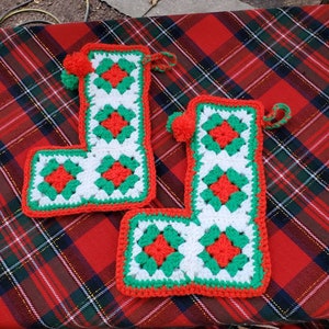 Set of 2 hand crochet Christmas stockings in red, green, and white, great for Christmas and the holidays