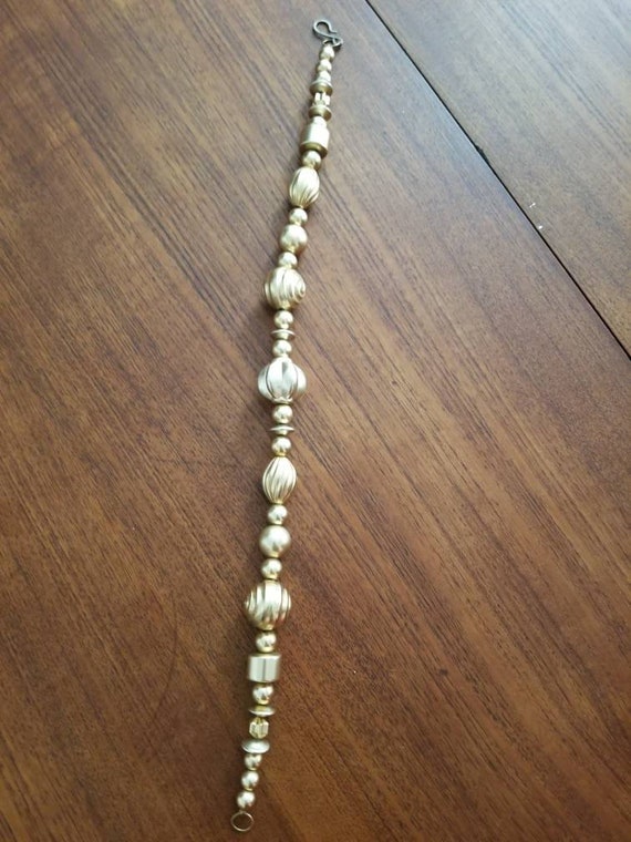 Vintage Plastic Gold Bead Costume Necklace - image 5