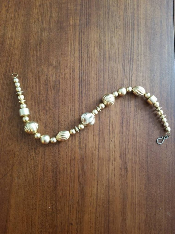 Vintage Plastic Gold Bead Costume Necklace - image 4