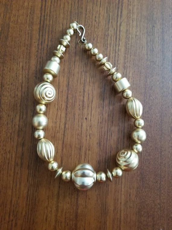 Vintage Plastic Gold Bead Costume Necklace - image 1