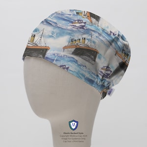 May include: A blue and white patterned surgical cap with an elastic back. The pattern features a repeating image of a large ocean liner sailing on the water. The cap has the text "Copyright Medicus Cap 2024" and "Image For Guidance Only" printed on the bottom.