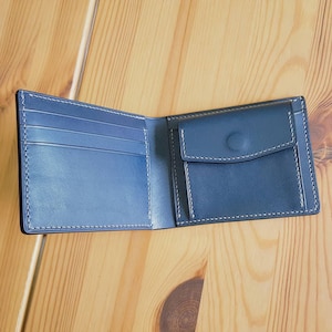 Cartera plegable con monedero
