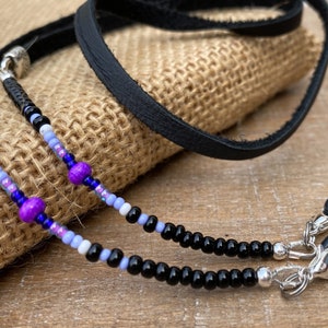Simple Western eyeglass chain with black leather and purple seed beads. Boho neck strap cord for sunglasses shades readers eye glasses.