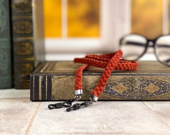 Red braided leather eyeglass chain with gunmetal and black hardware. Custom lengths available. Red glasses chain handmade birthday gifts.