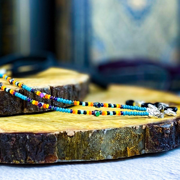 Southwest colorful beaded eyeglass chain with leather. Turquoise orange yellow black iridescent hematite. Cord for readers and sunglasses.