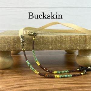 Minimal style eyeglass chain. Matte brown, golden harvest and turquoise colored glass beads. Brown leather Sunglasses holder. Glasses cord. Buckskin