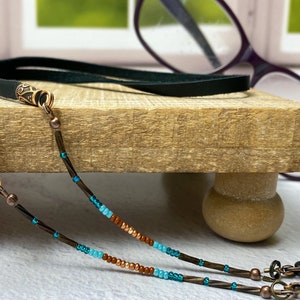 Minimalist eyeglass chain with tiny brown, turquoise seed beads. Leather eye glasses cord. Holder neck strap for sunglasses readers.