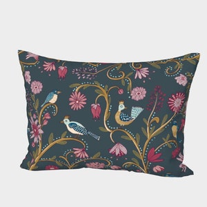 May include: A teal blue cushion with a floral pattern featuring pink and red flowers, gold vines, and colourful birds.
