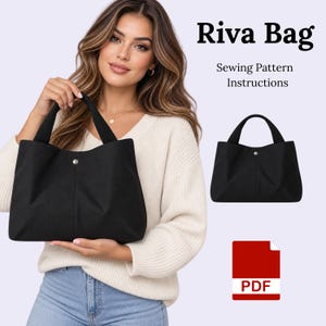 May include: A black tote bag with a single top handle and a central silver snap button closure. The text Riva Bag Sewing Pattern Instructions is displayed alongside a PDF icon. The bag features a structured design with side pleats and a clean finish.