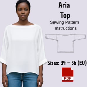 May include: A white boat-neck top with three-quarter length sleeves, paired with a technical line drawing of the garment. Text reads: Aria Top Sewing Pattern Instructions, Sizes: 34 – 56 (EU), and a red PDF icon for this digital sewing pattern.