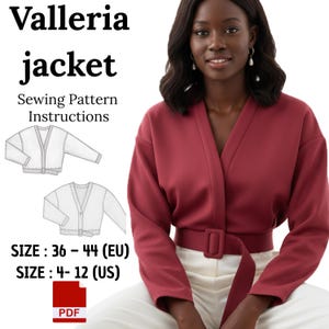 May include: A digital PDF sewing pattern for the Valleria jacket, featuring a deep red jacket with a V-neckline, long sleeves, and a matching fabric belt with a rectangular buckle. Includes technical line drawings and sizes 4-12 (US).