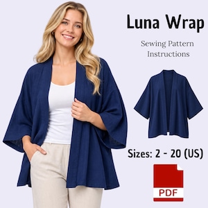 May include: A navy blue open-front wrap jacket with wide three-quarter length sleeves. The text reads Luna Wrap Sewing Pattern Instructions, Sizes: 2 - 20 (US), and includes a red PDF icon. The garment is worn over a white top and beige pants.
